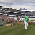 Rickie Fowler hits from the 16th tee during the third round of the Phoenix Open PGA golf tournament, Saturday, Feb. 2, 2019, in Scottsdale, Ariz. (AP Photo/Matt York)