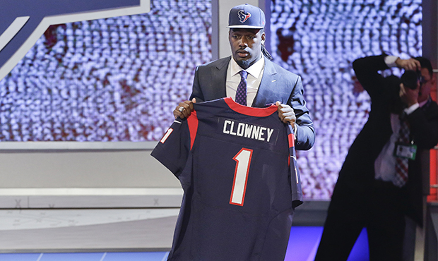 South Carolina defensive end Jadeveon Clowney holds up a jersey for the Houston Texans after being ...
