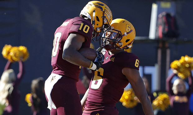 Arizona State wide receiver Geordon Porter, right, celebrates after wide receiver Kyle Williams, le...