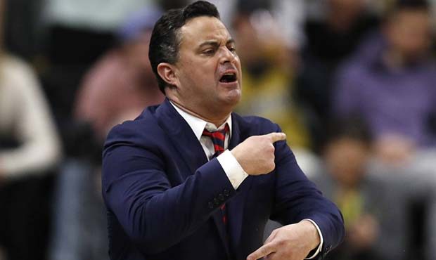 Arizona head coach Sean Miller directs his team against Colorado in the first half of an NCAA colle...