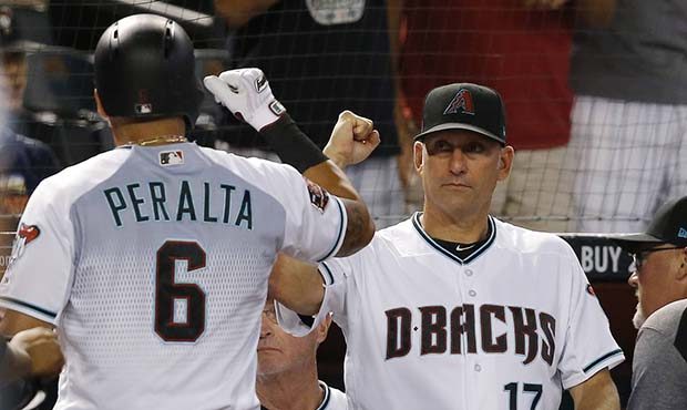 Arizona Diamondbacks' David Peralta (6) celebrates his two-run home run against the Los Angeles Ang...