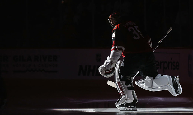 Goaltender Darcy Kuemper #35 of the Arizona Coyotes skates out onto the ice before the NHL game aga...