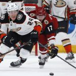 Anaheim Ducks center Carter Rowney (24) and Arizona Coyotes center Alex Galchenyuk (17) go after the puck during the third period of an NHL hockey game Tuesday, March 5, 2019, in Glendale, Ariz. The Ducks won 3-1. (AP Photo/Ross D. Franklin)