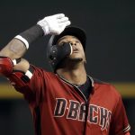 Arizona Diamondbacks' Ketel Marte looks skyward as he stands on first base after hitting a single against the Chicago White Sox in the second inning of a spring training baseball game Monday, March 25, 2019, in Phoenix, Ariz. (AP Photo/Elaine Thompson)