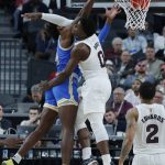 Arizona State's Luguentz Dort, right fouls UCLA's Jalen Hill during the second half of an NCAA college basketball game in the quarterfinals of the Pac-12 men's tournament Thursday, March 14, 2019, in Las Vegas. (AP Photo/John Locher)