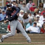 Cleveland Indians' Trayce Thompson doubles in a pair of runs against the Arizona Diamondbacks in the third inning of a spring training baseball game Thursday, March 7, 2019, in Scottsdale, Ariz. (AP Photo/Elaine Thompson)