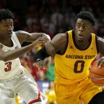 Arizona State guard Luguentz Dort (0) drives past Arizona guard Dylan Smith in the first half during an NCAA college basketball game, Saturday, March 9, 2019, in Tucson, Ariz. (AP Photo/Rick Scuteri)