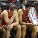 Arizona's Justin Coleman, Ryan Luther, Ira Lee and Brandon Randolph, from left, sit on the bench as the seconds tick away during the team's NCAA college basketball game against Oregon on Saturday, March 2, 2019, in Eugene, Ore. (AP Photo/Chris Pietsch)