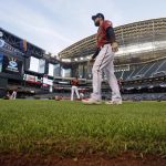 Arizona Diamondbacks' Steven Souza Jr. walks on new turf at the team's home field before a spring training baseball game against the Chicago White Sox, Monday, March 25, 2019, in Phoenix, Ariz. The synthetic grass at Chase Field is designed specifically for baseball. The team previously played on grass there. (AP Photo/Elaine Thompson)