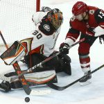 Anaheim Ducks goaltender Ryan Miller (30) makes a save on a shot by Arizona Coyotes center Vinnie Hinostroza (13) during the second period of an NHL hockey game Tuesday, March 5, 2019, in Glendale, Ariz. (AP Photo/Ross D. Franklin)
