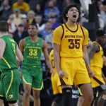 Arizona State's Taeshon Cherry (35) celebrates after a play against Oregon during the first half of an NCAA college basketball game in the semifinals of the Pac-12 men's tournament Friday, March 15, 2019, in Las Vegas. (AP Photo/John Locher)