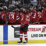 New Jersey Devils right wing Drew Stafford (18) swings by the bench after scoring a goal against the Arizona Coyotes during the first period of an NHL hockey game, Saturday, March 23, 2019, in Newark, N.J. (AP Photo/Julio Cortez)