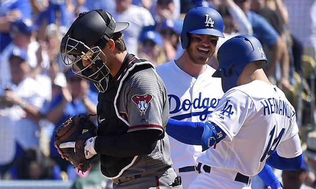 Los Angeles Dodgers' Enrique Hernandez, right, celebrates his two-run home run with Joc Pederson, c...