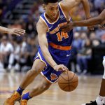 New York Knicks guard Allonzo Trier (14) drives against the Phoenix Suns during the first half of an NBA basketball game Wednesday, March 6, 2019, in Phoenix. (AP Photo/Matt York)