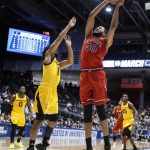 St. John's LJ Figueroa (30) shoots against Arizona State's Remy Martin (1) during the second half of a First Four game of the NCAA men's college basketball tournament Wednesday, March 20, 2019, in Dayton, Ohio. (AP Photo/John Minchillo)
