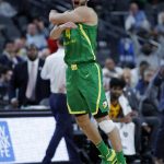 Oregon's Ehab Amin (4) celebrates after a play against Arizona State during the second half of an NCAA college basketball game in the semifinals of the Pac-12 men's tournament Friday, March 15, 2019, in Las Vegas. (AP Photo/John Locher)