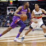Phoenix Suns forward Mikal Bridges (25) drives past New Orleans Pelicans guard Frank Jackson (15) during the first half of an NBA basketball game in New Orleans, Saturday, March 16, 2019. (AP Photo/Tyler Kaufman)