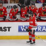 Chicago Blackhawks right wing Patrick Kane (88) celebrates with teammates after scoring against the Arizona Coyotes during the second period of an NHL hockey game Monday, March 11, 2019, in Chicago. (AP Photo/Kamil Krzaczynski)