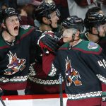 Arizona Coyotes right wing Michael Grabner (40) celebrates his goal against the Los Angeles Kings with Coyotes' Jakob Chychrun, left, during the first period of an NHL hockey game Saturday, March 9, 2019, in Glendale, Ariz. (AP Photo/Ross D. Franklin)
