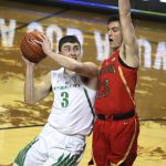 Arizona Oregon's Payton Pritchard, left, is fouled going to the basket by Arizona's Alex Barcello, right, during the second half of an NCAA college basketball game Saturday, March 2, 2019, in Eugene, Ore. (AP Photo/Chris Pietsch)