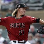 Arizona Diamondbacks starting pitcher Zack Greinke throws against the Cleveland Indians in the first inning of a spring training baseball game Thursday, March 7, 2019, in Scottsdale, Ariz. (AP Photo/Elaine Thompson)