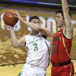 Arizona Oregon's Payton Pritchard, left, is fouled by Arizona's Alex Barcello, right, during the second half of an NCAA college basketball game Saturday, March 2, 2019, in Eugene, Ore. (AP Photo/Chris Pietsch)