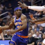 New York Knicks guard Damyean Dotson (21) drives against the Phoenix Suns during the first half of an NBA basketball game Wednesday, March 6, 2019, in Phoenix. (AP Photo/Matt York)