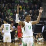 Oregon's Kenny Wooten gestures to the crowd at the end of the team's NCAA college basketball game against Arizona on Saturday, March 2, 2019, in Eugene, Ore. (AP Photo/Chris Pietsch)