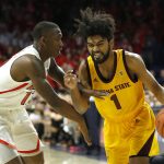 Arizona State guard Remy Martin, right, drives on Arizona guard Justin Coleman, left, in the first half during an NCAA college basketball game, Saturday, March 9, 2019, in Tucson, Ariz. (AP Photo/Rick Scuteri)