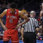 St. John's Justin Simon (5) reacts alongside coach Chris Mullin, right, during the second half of the team's First Four game against Arizona State in the NCAA men's college basketball tournament Wednesday, March 20, 2019, in Dayton, Ohio. (AP Photo/John Minchillo)