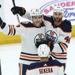 Edmonton Oilers defenseman Matt Benning (83) celebrates his goal against the Arizona Coyotes with Oilers defenseman Andrej Sekera (2) and right wing Zack Kassian (44) during the second period of an NHL hockey game Saturday, March 16, 2019, in Glendale, Ariz. (AP Photo/Ross D. Franklin)