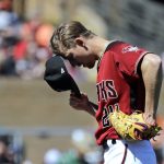 Arizona Diamondbacks starting pitcher Luke Weaver pauses for a few moments before throwing against the San Francisco Giants in the third inning of a spring training baseball game Thursday, March 14, 2019, in Scottsdale, Ariz. (AP Photo/Elaine Thompson)