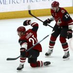 Arizona Coyotes center Nick Cousins (25) celebrates his goal against the Chicago Blackhawks with Oliver Ekman-Larsson (23) during the third period of an NHL hockey game Tuesday, March 26, 2019, in Glendale, Ariz. The Coyotes defeated the Blackhawks 1-0. (AP Photo/Ross D. Franklin)