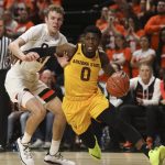 Arizona State's Luguentz Dort (0) drives to the basket, past Oregon State's Kylor Kelley (24) during the first half of an NCAA college basketball game in Corvallis, Ore., Sunday, March 3, 2019. (AP Photo/Amanda Loman)