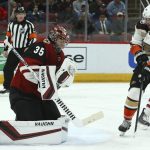 Anaheim Ducks center Adam Henrique (14) scores a goal against Arizona Coyotes goaltender Darcy Kuemper (35) during the third period of an NHL hockey game Tuesday, March 5, 2019, in Glendale, Ariz. The Ducks won 3-1. (AP Photo/Ross D. Franklin)
