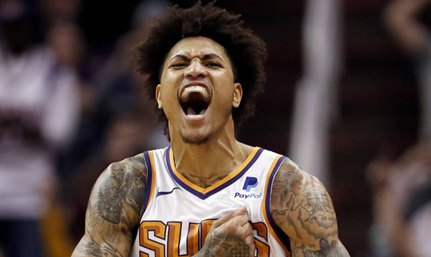 Phoenix Suns forward Kelly Oubre Jr. (3) reacts to a forced turnover against the Milwaukee Bucks du...
