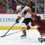 Anaheim Ducks right wing Daniel Sprong (11) shoots in front of Arizona Coyotes defenseman Niklas Hjalmarsson in the first period during an NHL hockey game, Thursday, March 14, 2019, in Glendale, Ariz. (AP Photo/Rick Scuteri)