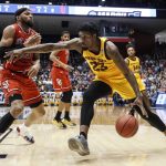 Arizona State's Romello White (23) drives against St. John's Marvin Clark II (13) during the first half of a First Four game of the NCAA men's college basketball tournament Wednesday, March 20, 2019, in Dayton, Ohio. (AP Photo/John Minchillo)