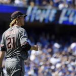 Arizona Diamondbacks starting pitcher Zack Greinke walks back to the mound after giving up a home run to Los Angeles Dodgers' Austin Barnes during the fourth inning of a baseball game Thursday, March 28, 2019, in Los Angeles. (AP Photo/Mark J. Terrill)