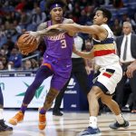 Phoenix Suns forward Kelly Oubre Jr. (3) drives past New Orleans Pelicans guard Frank Jackson (15) during the first half of an NBA basketball game in New Orleans, Saturday, March 16, 2019. (AP Photo/Tyler Kaufman)