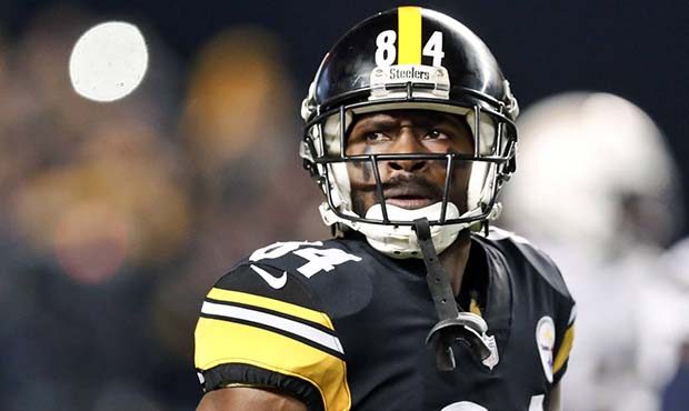 In this Dec. 2, 2018, file photo, Pittsburgh Steelers wide receiver Antonio Brown (84) plays agains...