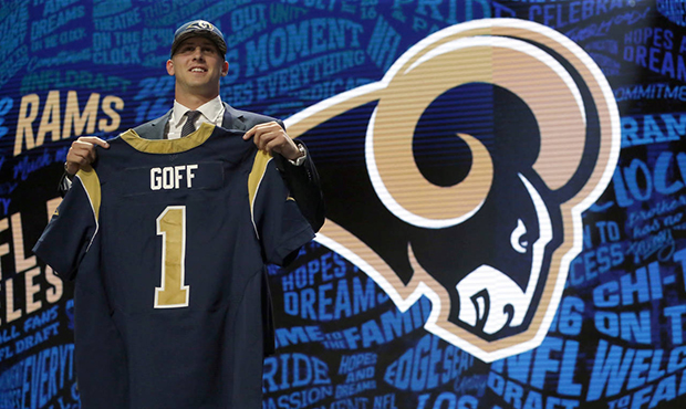 California’s Jared Goff poses for photos after being selected by the Los Angeles Rams as the firs...