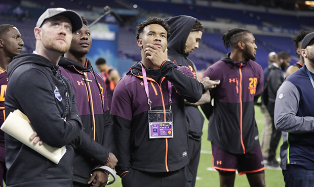 Oklahoma quarterback Kyler Murray watches drills at the NFL football scouting combine in Indianapol...