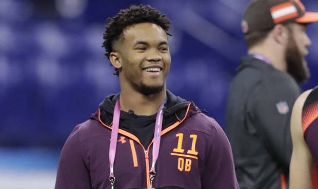 Oklahoma quarterback Kyler Murray (11) watches drills at the NFL football scouting combine with Nor...