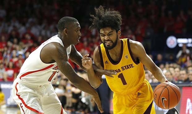 Arizona State guard Remy Martin, right, drives on Arizona guard Justin Coleman, left, in the first ...