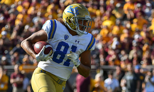 TEMPE, AZ - NOVEMBER 10:  Tight end Caleb Wilson #81 of the UCLA Bruins carries the football for a ...