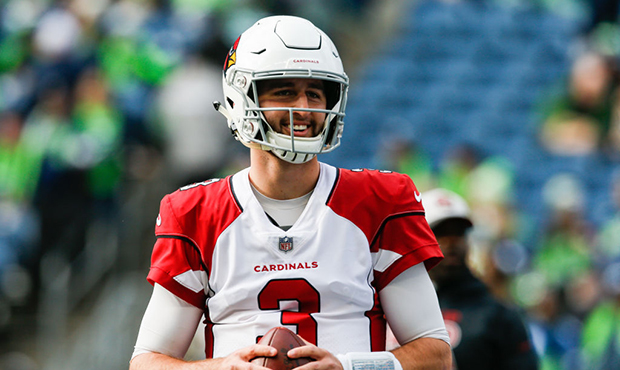 Josh Rosen #3 of the Arizona Cardinals warms-up before the game against the Seattle Seahawks at Cen...