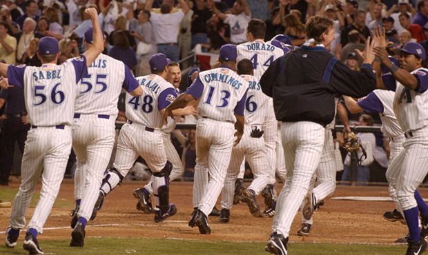 4 Nov 2001: The Arizona Diamondbacks stream onto the field after beating the New York Yankees in ga...