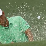 Gary Woodland hits from a bunker on the second hole during the second round for the Masters golf tournament Friday, April 12, 2019, in Augusta, Ga. (AP Photo/Matt Slocum)