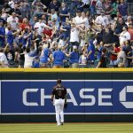 Arizona Diamondbacks outfielder David Peralta watches as a two-run home run by Chicago Cubs' David Bote lands in the left field bleachers during the fifth inning of a baseball game, Saturday, April 27, 2019, in Phoenix. (AP Photo/Ralph Freso)